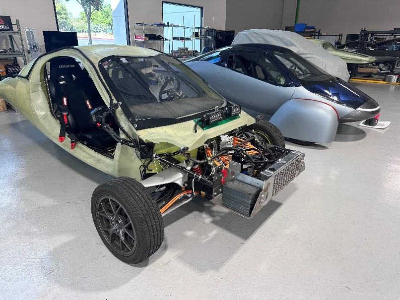 Aptera prototype chassis and front suspension hardware during build integration and validation