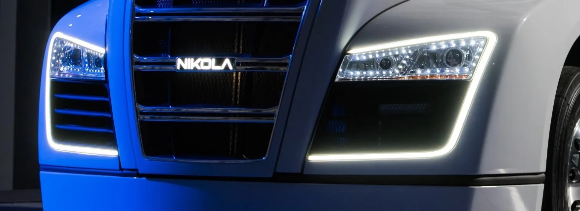 Close-up of Nikola One headlamp, front fascia, and grille hardware fitment