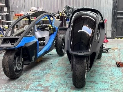 Step 7: Multiple Trinity self-balancing commuter prototypes side by side in the shop