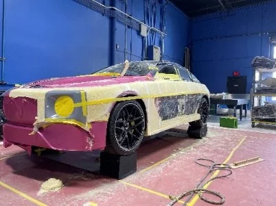 WILL.I.AMG body panels and relocated upper structure during shop fabrication at West Coast Customs